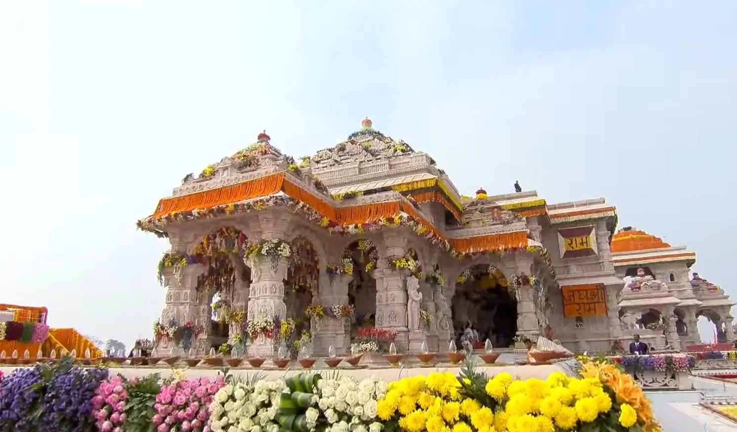 The Ram Mandir in Ayodhya decorated with marigold garlands and flower beds