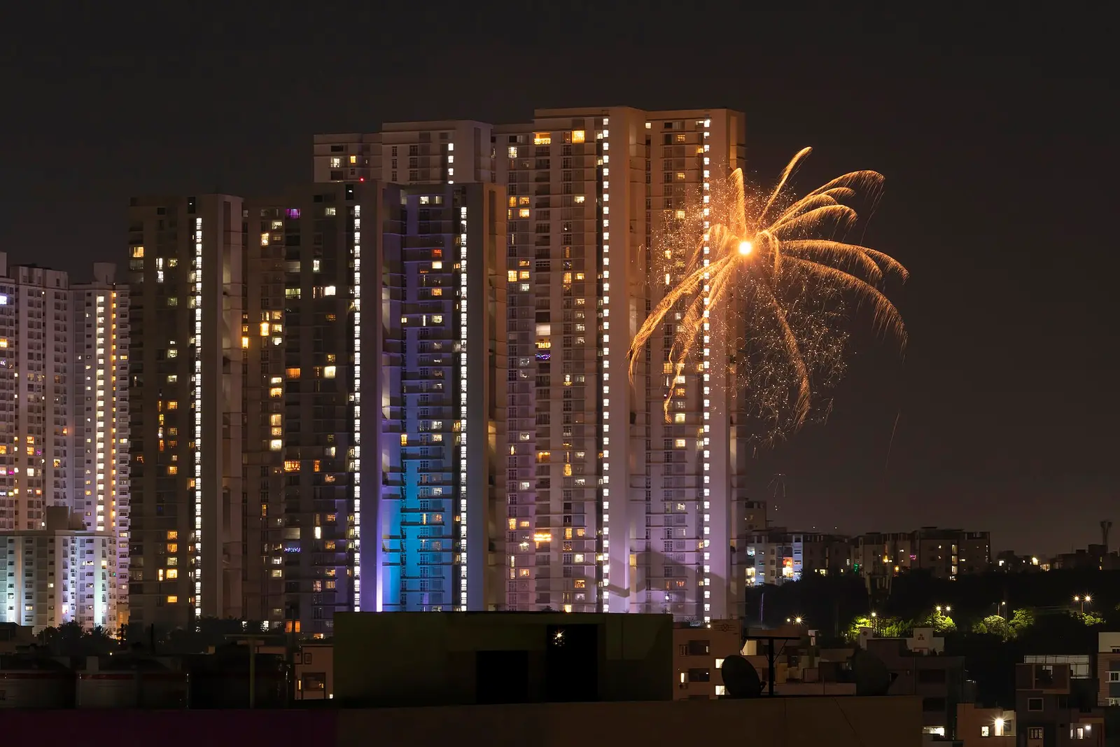 Fireworks over apartment towers in Hyderabad on Diwali night