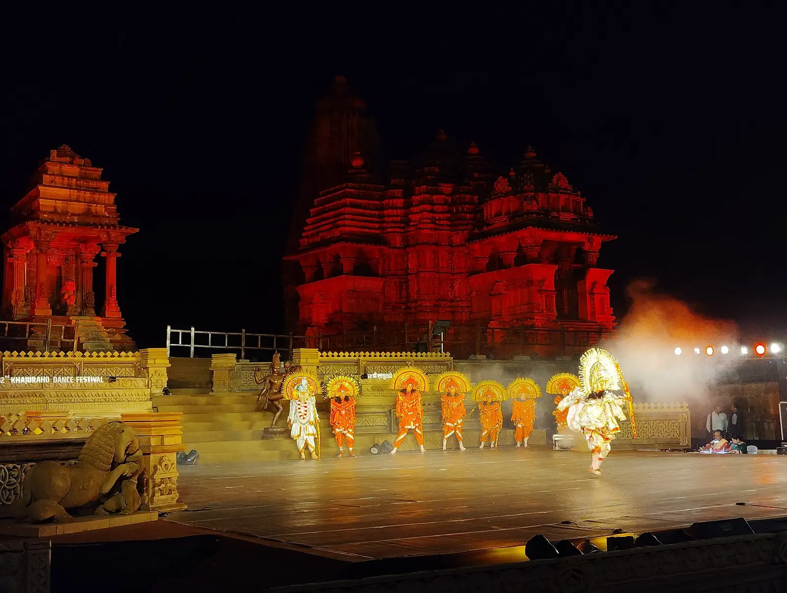Dancers performing on a floodlit stage before Matangeshvara temple at Khajuraho